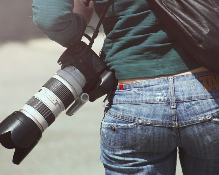 photographer carrying camera